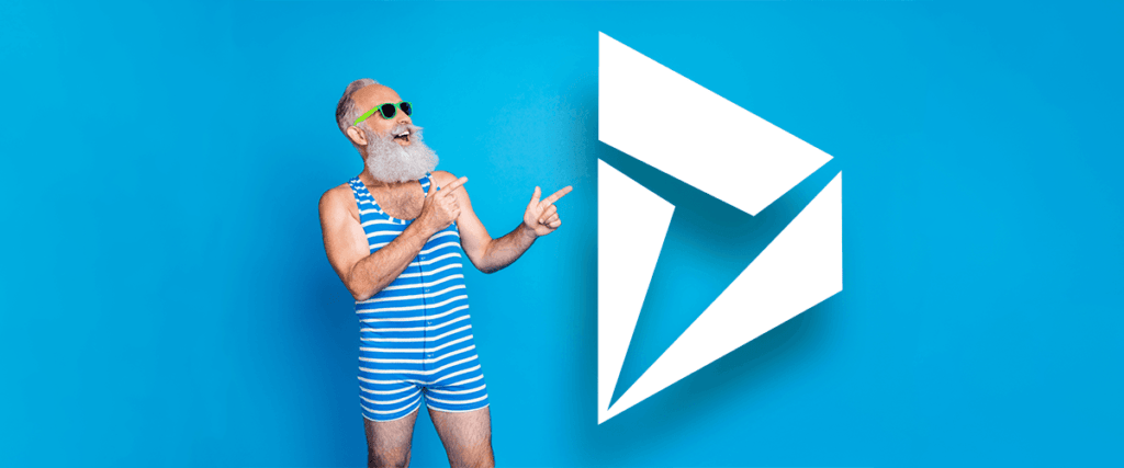 Titelbild: Hipster mit grauem Bart zeigt auf riesiges Dynmaics 365 Logo